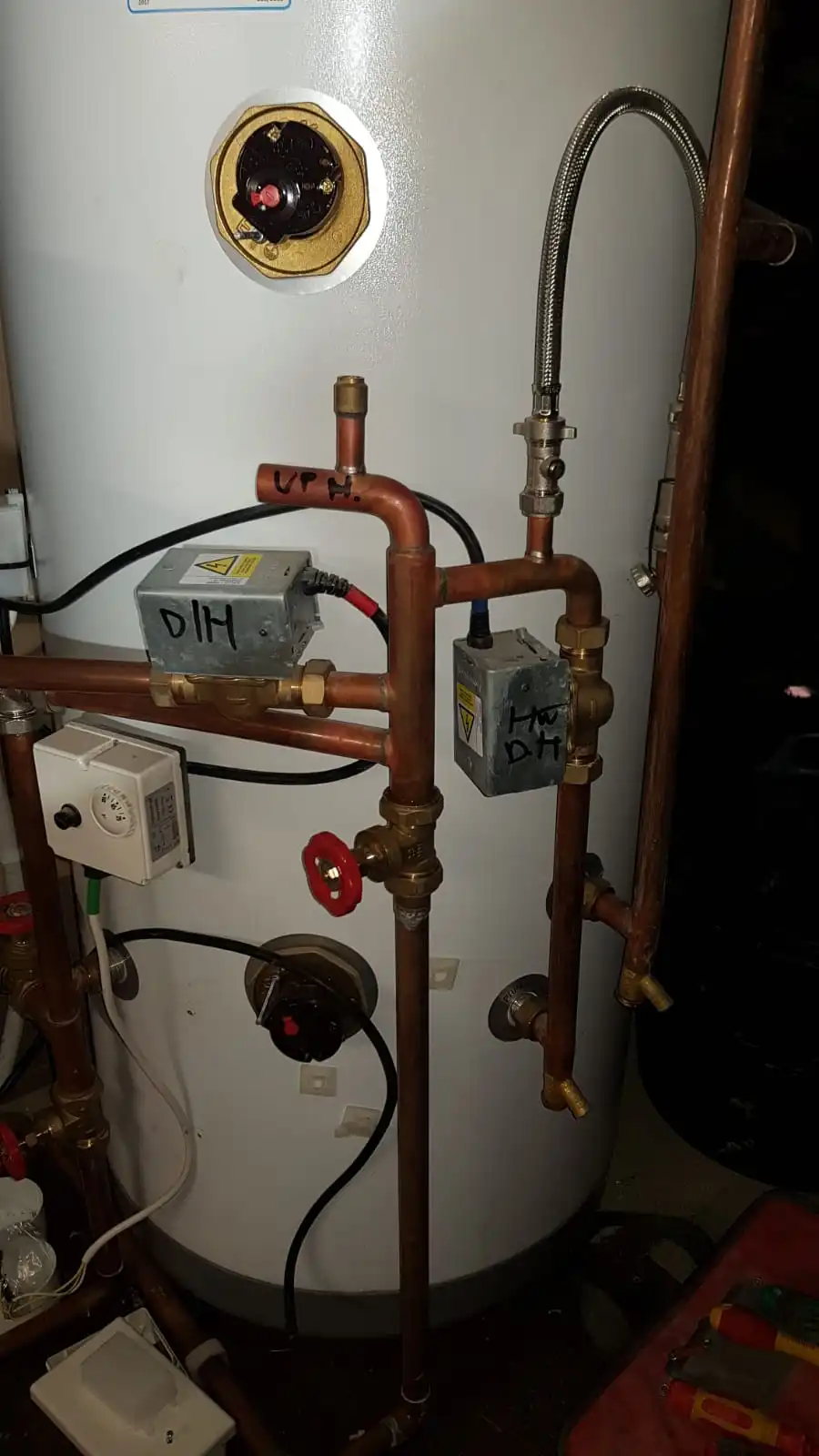 Gas Safe engineer repairing a combi boiler in Accrington. Diagnostics, parts replacement and safety checks