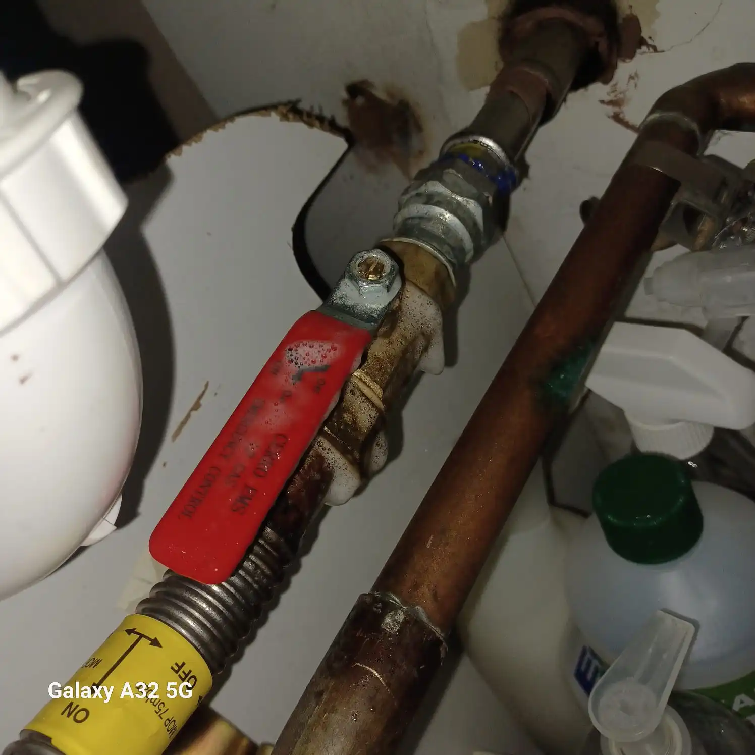 Gas Safe engineer repairing a combi boiler in Ashton‑under‑Lyne. Diagnostics, parts replacement and safety checks