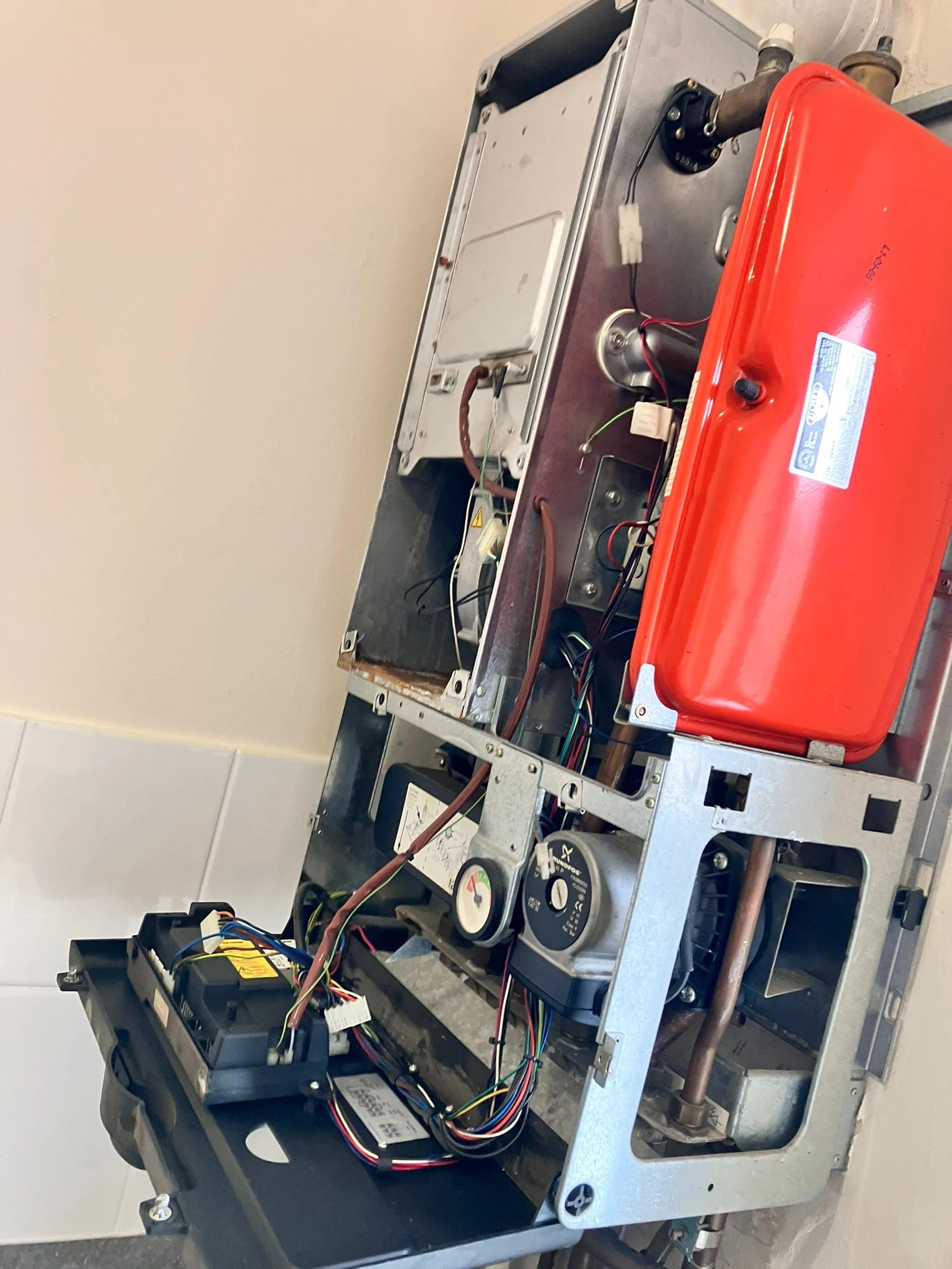 Gas Safe engineer repairing a combi boiler in Tottington. Diagnostics, parts replacement and safety checks